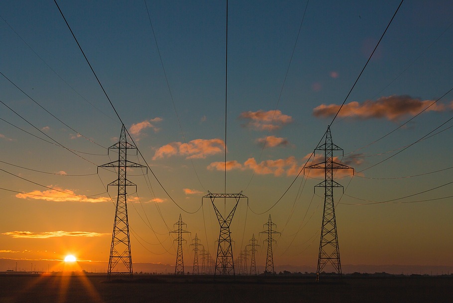 Power poles at sunset